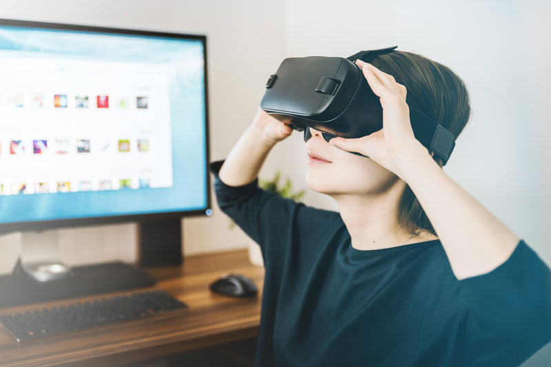 girl using virtual reality glasses