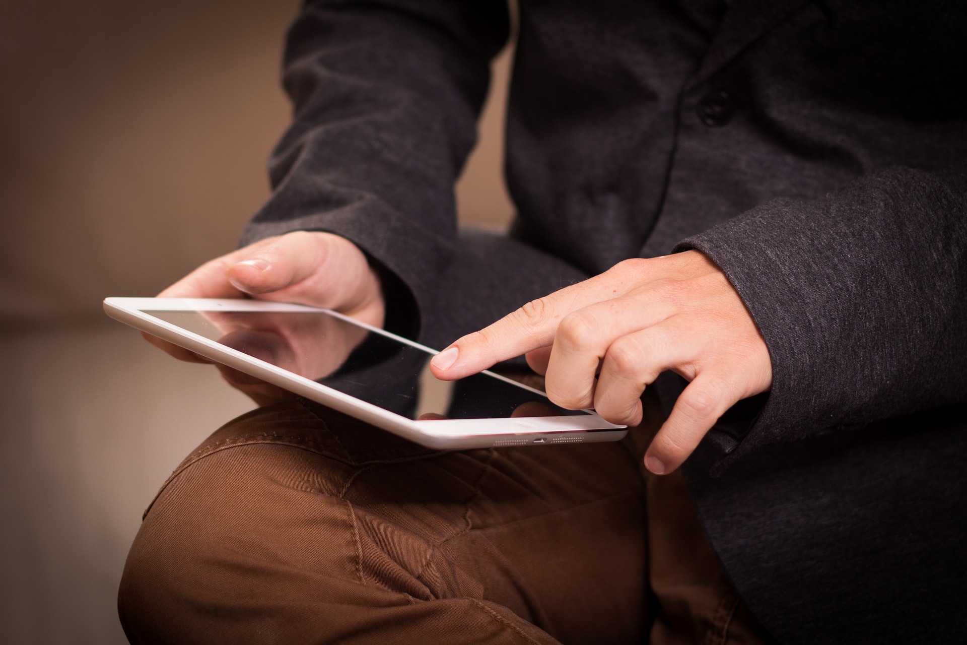 person using tablet