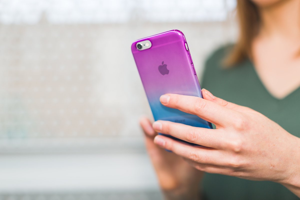 woman using colorful iphone